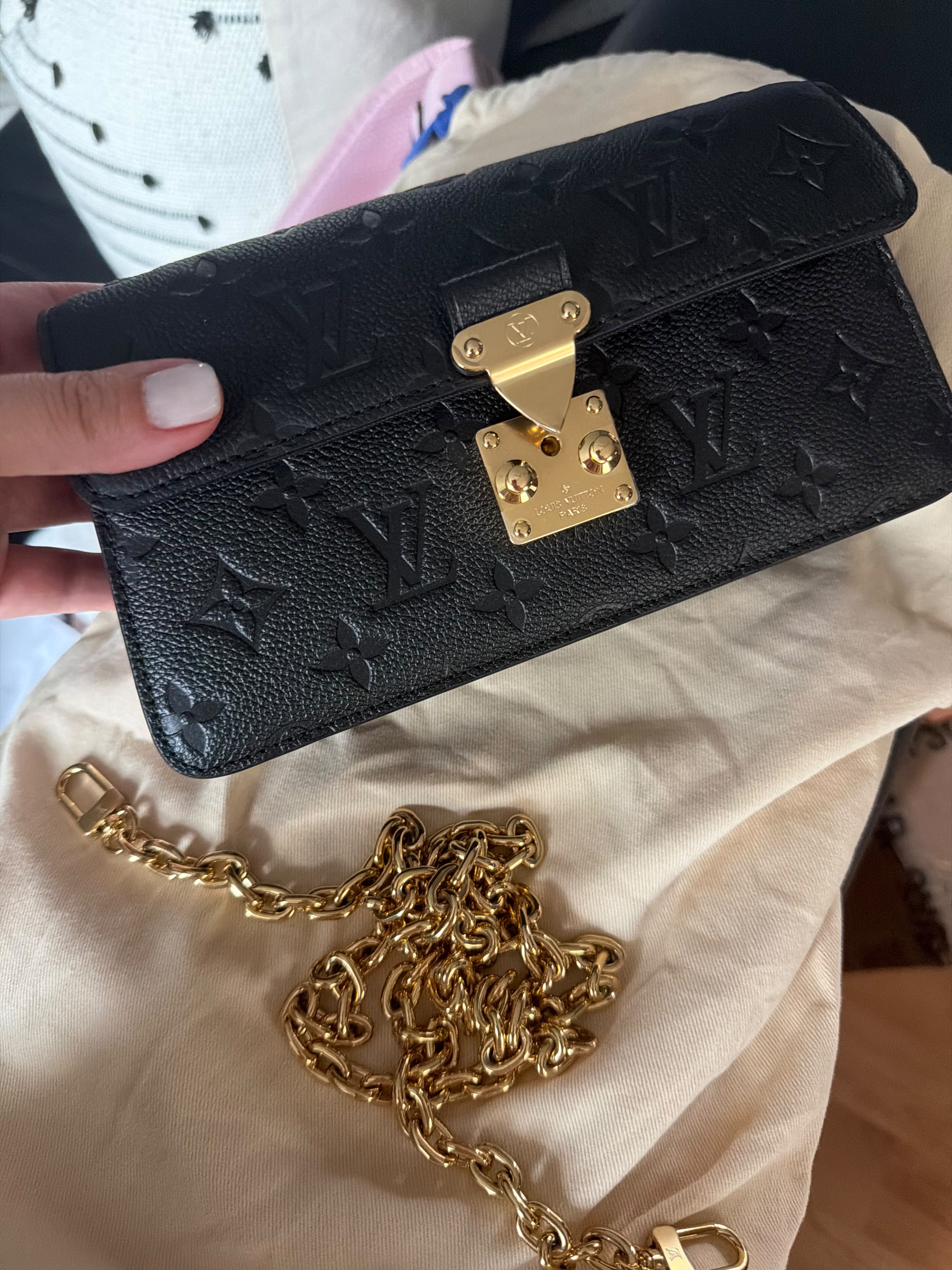 Lv Woc black embossed gold chain